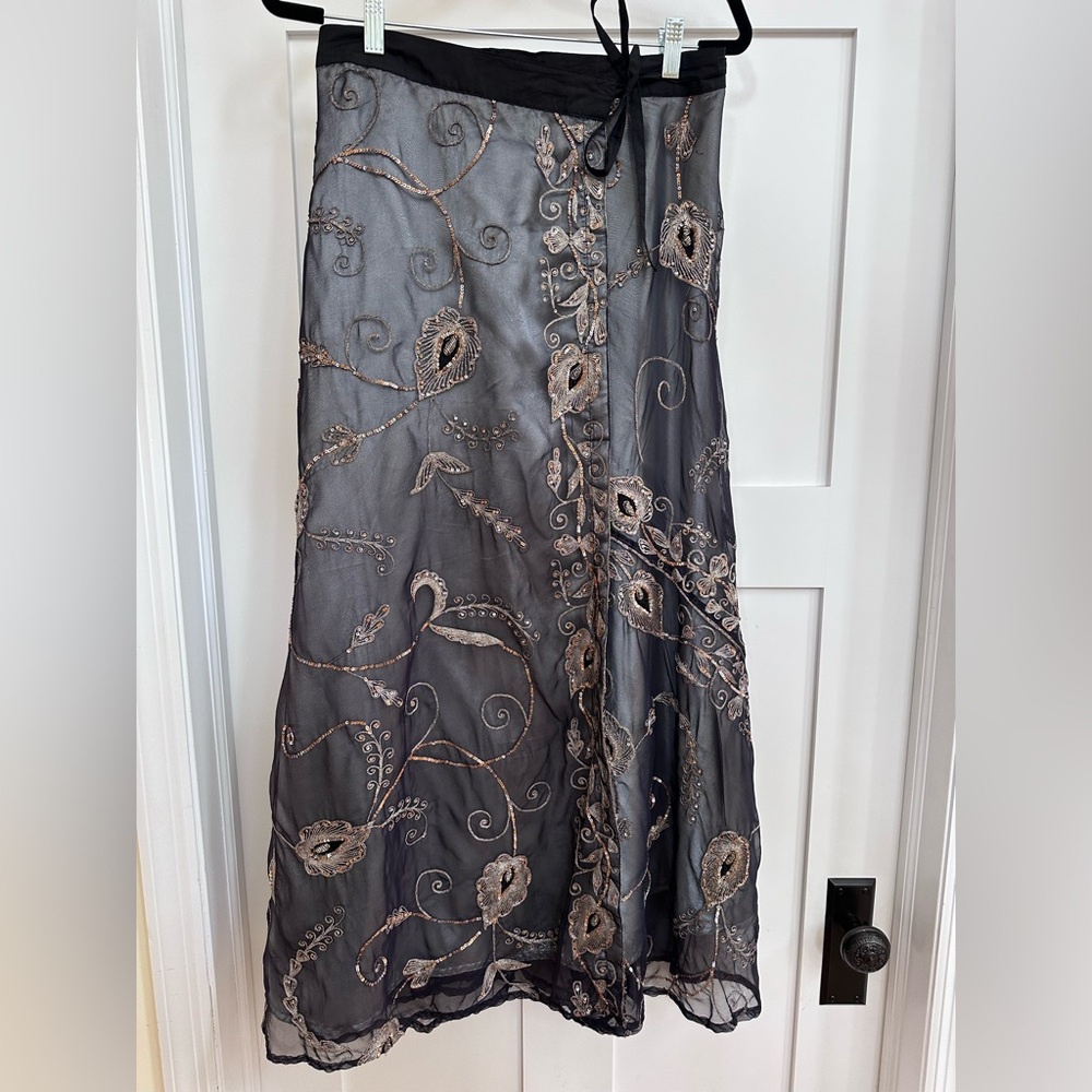 Sequined and beaded wrap skirt.